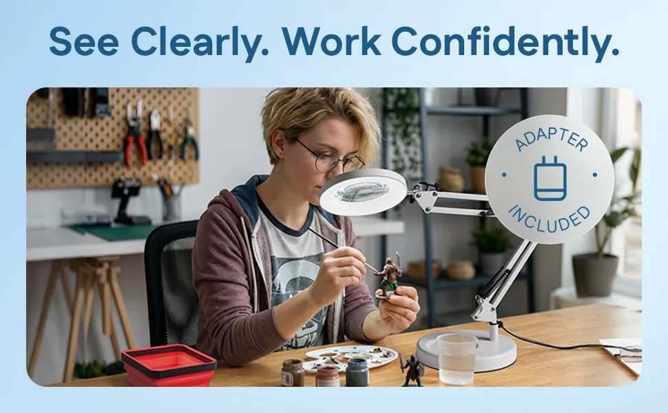 A crafter working with a PURAMADOR magnifying lamp